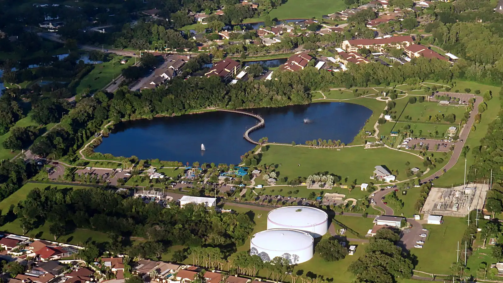 An aerial view of Carrollwood Village Park and its pond in Carrollwood, Florida