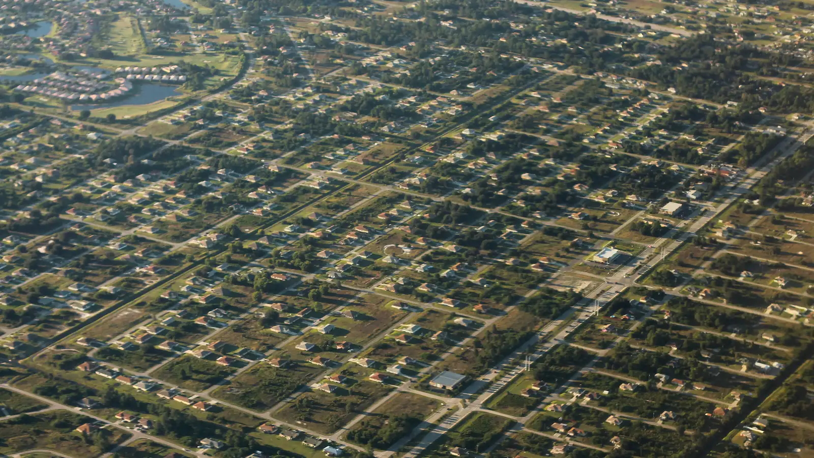 Aerial view of Gunnery Road and neighborhoods in Lehigh Acres, Florida
