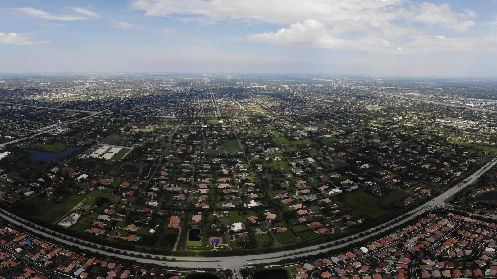 Aerial view of Plantation, Florida, looking east over homes and tree-lined streets