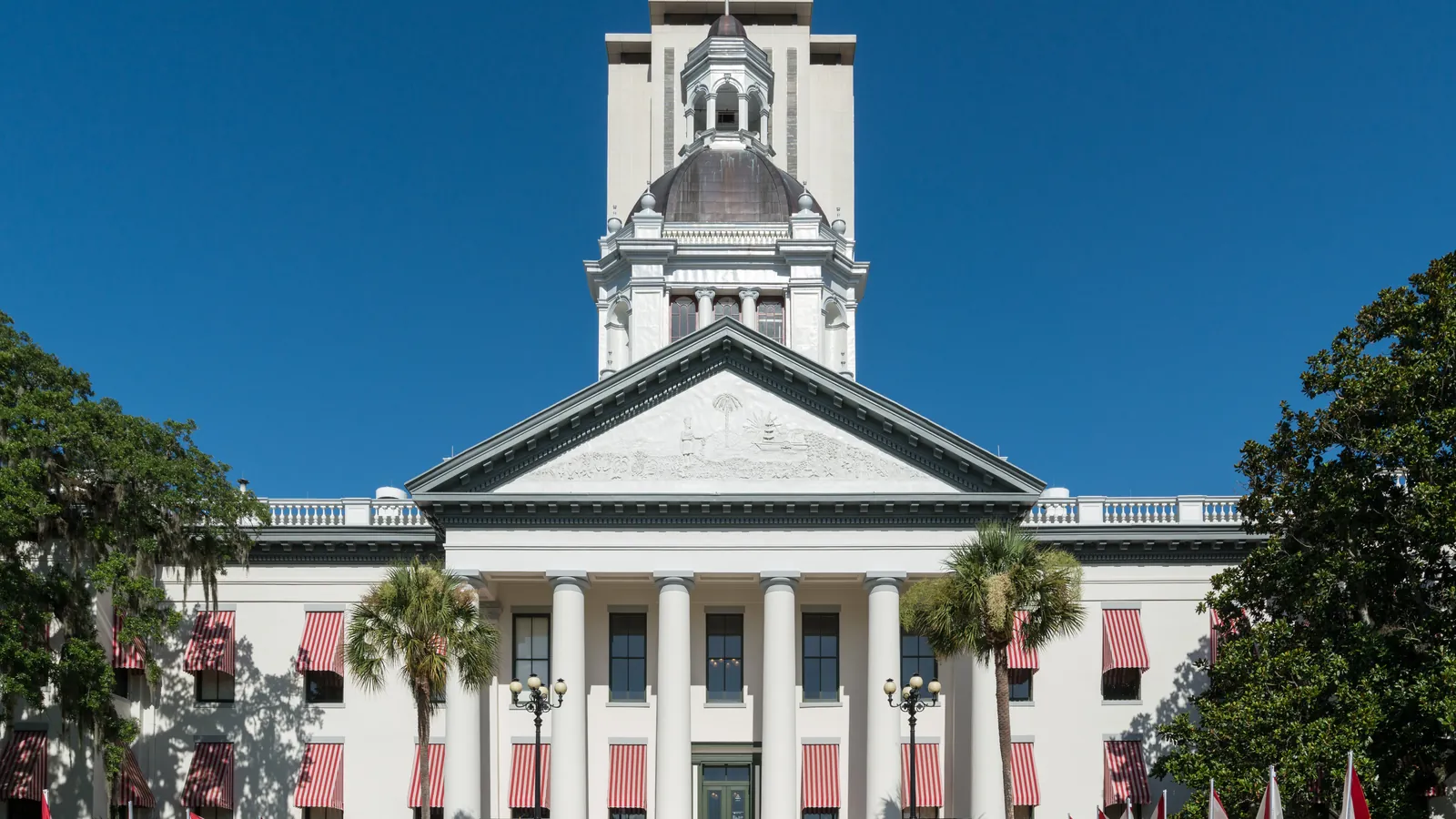 The Historic Capitol in Tallahassee, with its red and white striped awnings