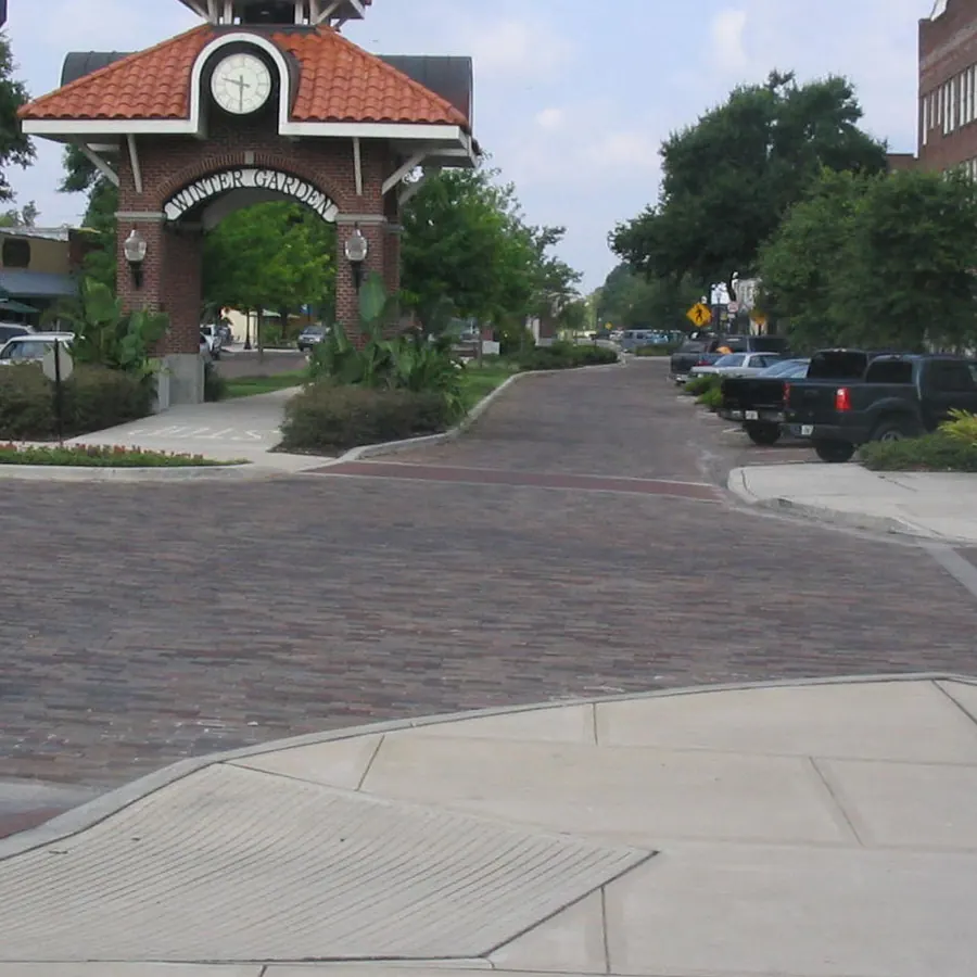 Brick street and clock tower archway in downtown Winter Garden